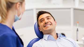 Man smiling in the dental chair